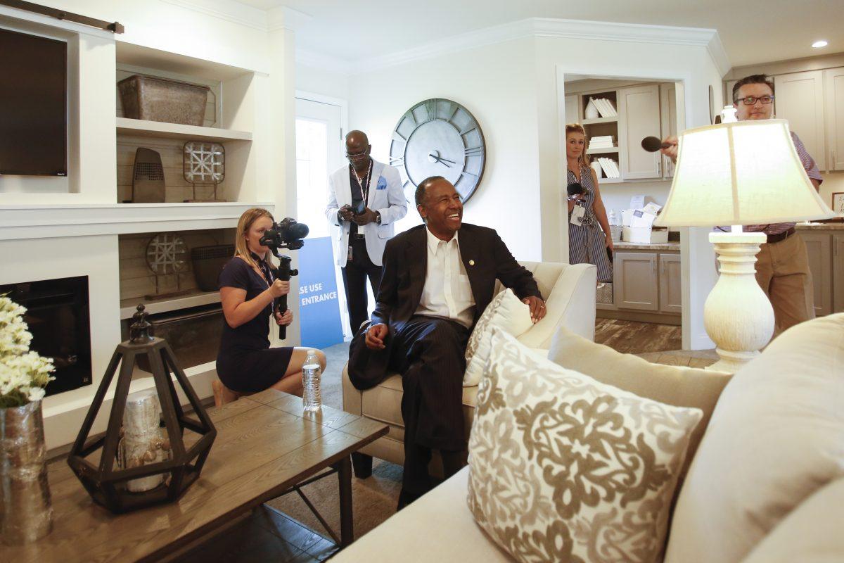 Secretary of Housing and Urban Development Ben Carson visits a house by Skyline Champion homebuilders at the Innovative Housing Showcase on the National Mall in Washington on June 1, 2019. (Samira Bouaou/The Epoch Times)