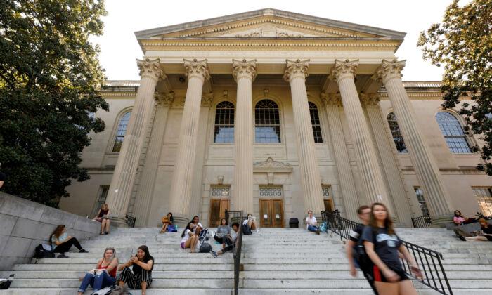 Students sit on the steps of Wilson Library on the campus of University of North Carolina at Chapel Hill, N.C., on Sept. 20, 2018. (Jonathan Drake/Reuters)