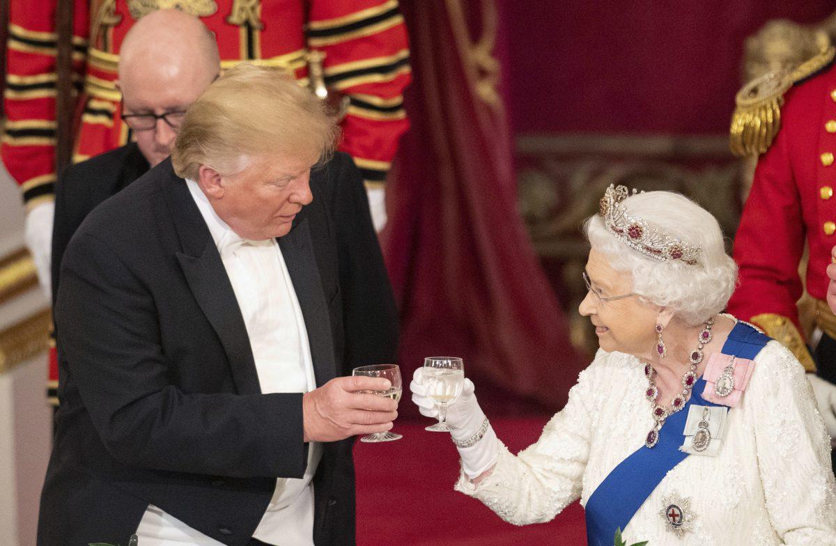 President Donald Trump, left and Queen Elizabeth II toast, during the State Banquet at Buckingham Palace, in London, June 3, 2019. Trump is on a three-day state visit to Britain. (Dominic Lipinski/Pool Photo via AP)