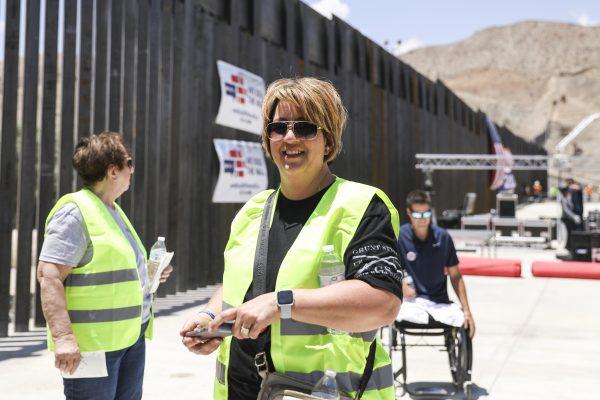 Michelle Balogh, sister of slain Border Patrol agent Brian Terry, at the new half-mile section of border fence built by We Build the Wall at Sunland Park, N.M., on May 30, 2019. (Charlotte Cuthbertson/The Epoch Times)