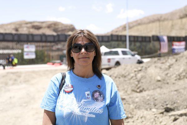 Michelle Root talks about her daughter Sarah, who was killed by an illegal alien in 2016, at the new half-mile section of border fence built by We Build the Wall at Sunland Park, N.M., on May 30, 2019. (Charlotte Cuthbertson/The Epoch Times)