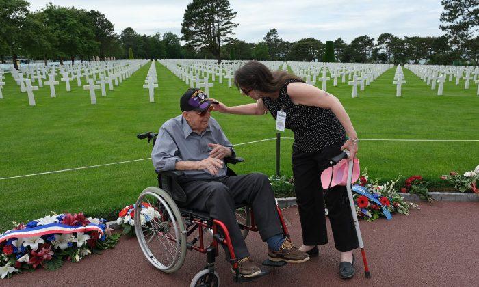 History Interpreters Keep Alive Memories of Fallen D-Day Soldiers