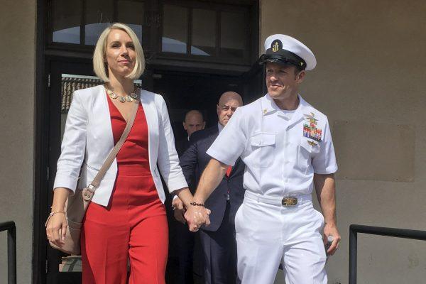 Navy Special Operations Chief Edward Gallagher, left, hugs his wife, Andrea Gallagher, after leaving a military courtroom on Naval Base San Diego in San Diego, on May 30, 2019. (Julie Watson/AP Photo)