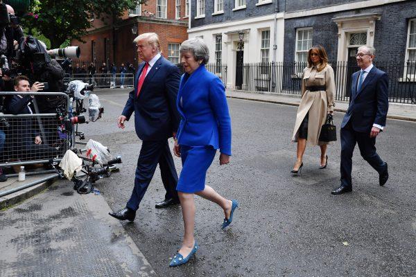 US President Donald Trump, Prime Minister Theresa May, her husband Philip May and First Lady Melania Trump leave 10 Downing Street, during the second day of his State Visit in London, England on June 4, 2019. (Jeff J Mitchell/Getty Images)