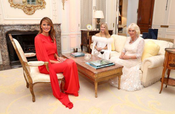 US First Lady Melania Trump (L), Suzanne Ircha (C), wife of the US Ambassador to London and Camilla (R), Duchess of Cornwall smile as they attend a dinner at Winfield House, during the state visit by US President Donald Trump in London, England on June 4, 2019. (Chris Jackson - WPA Pool/Getty Images)