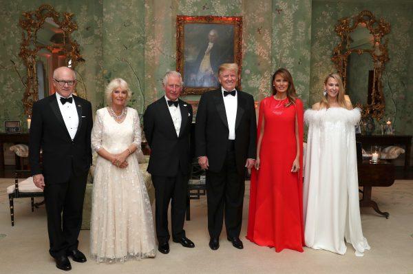 US President Donald Trump and First Lady Melania Trump host a dinner at Winfield House for Prince Charles, Prince of Wales and Camilla, Duchess of Cornwall, with US Ambassador to the UK Woody Johnson (L) and his wife Suzanne Ircha (R) during their state visit in London, England on June 4, 2019. (Chris Jackson - WPA Pool/Getty Images)