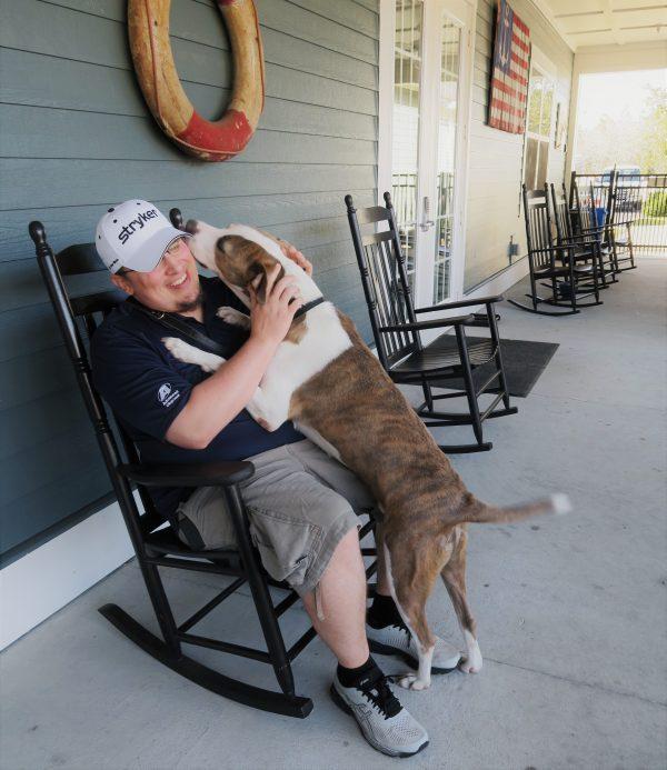 Jeremiah Galembush with his service dog Vinny. Galembush experienced severe PTSD following his deployment to Iraq. (Courtesy of K9s For Warriors)