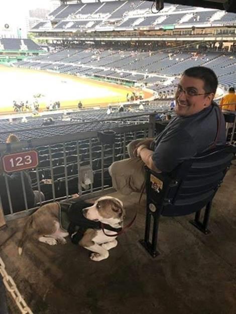Jeremiah Galembush at a baseball game with Vinny. (Courtesy of K9s For Warriors)