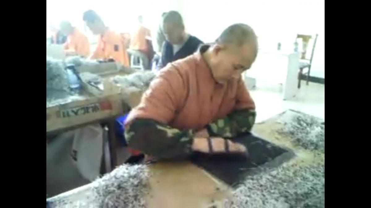 Undercover footage from Masanjia Forced Labor Camp in China shows inmates making diodes during the 2008 Beijing Olympics. (Courtesy of Yu Ming)