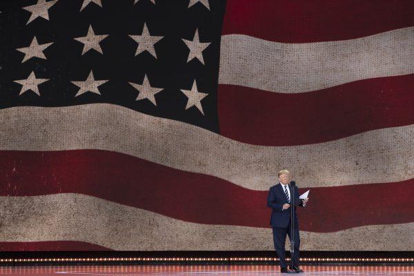 Donald Trump reads from the 32nd U.S. President President Franklin D. Roosevelt's prayer to the US on stage during the D-Day Commemorations on June 5, 2019 in Portsmouth, England.(Dan Kitwood/Getty Images)
