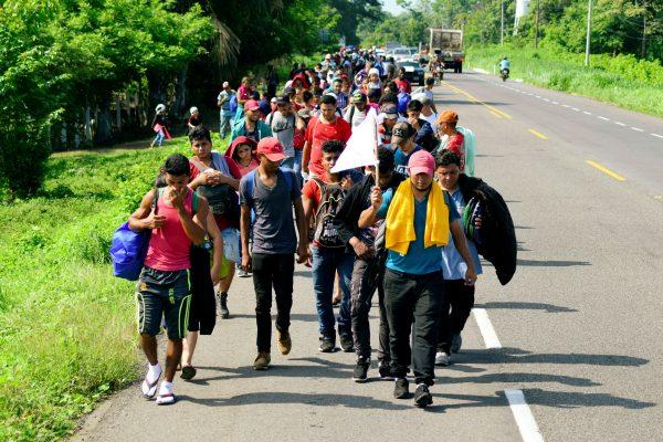 Migrants from Central America walk on a highway during their journey towards the United States, in Ciudad Hidalgo, Chiapas state, Mexico, on June 5, 2019. (Jose Torres/Reuters)