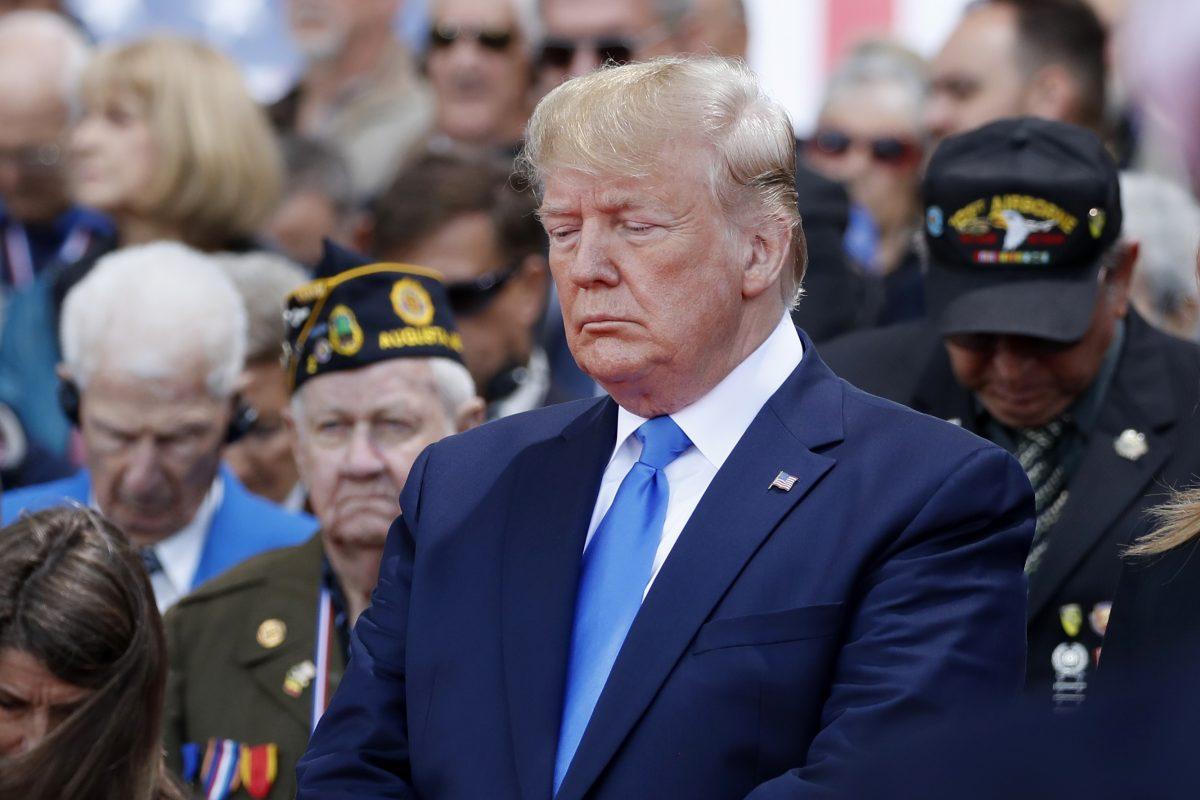 President Donald Trump participates in a ceremony to commemorate the 75th anniversary of D-Day at the American Normandy cemetery, Thursday, June 6, 2019, in Colleville-sur-Mer, Normandy, France. (AP Photo/Alex Brandon)
