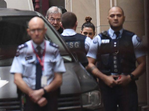 Cardinal George Pell, center rear, arrives at the Supreme Court of Victoria in Melbourne, on June 5, 2019. (Julian Smith/AAP Image via AP)