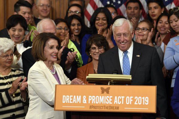 House Speaker Nancy Pelosi (D-Calif.) (L) shakes hands with House Minority Whip Steny Hoyer (D-Md.) (R) on Capitol Hill on June 4, 2019. (Susan Walsh/AP Photo)