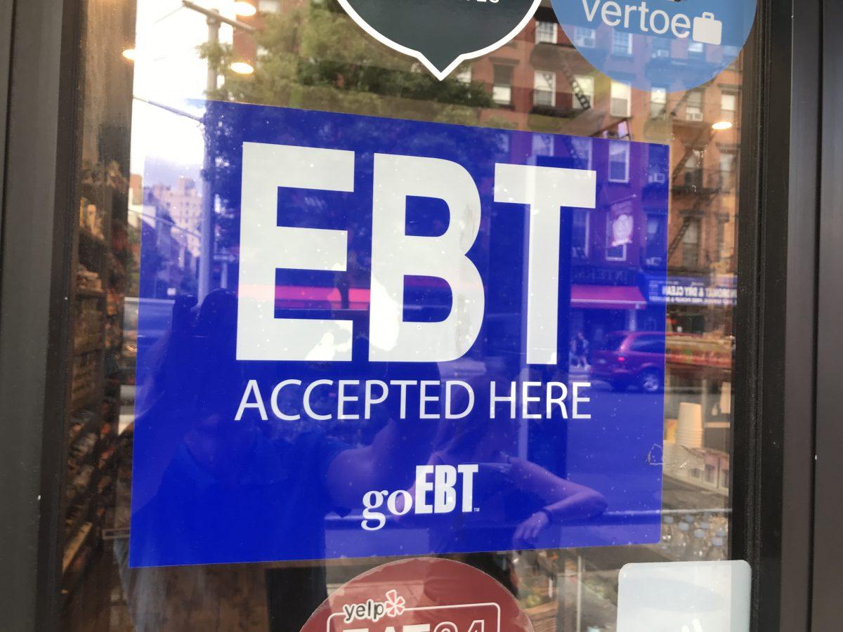 A store advertizes its acceptance of electronic benefit transfer cards in New York City on June 6, 2019. (Charlotte Cuthbertson/The Epoch Times)
