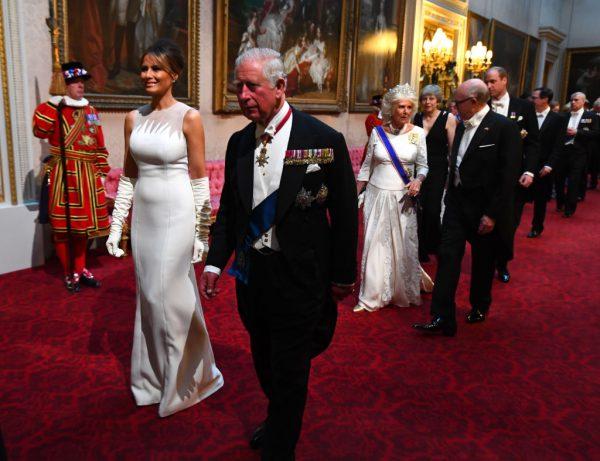 (L-R) First Lady Melania Trump and Prince Charles,Prince of Wales arrive through the East Gallery for a State Banquet at Buckingham Palace on June 3, 2019 in London, England. President Trump's three-day state visit will include lunch with the Queen, and a State Banquet at Buckingham Palace, as well as business meetings with the Prime Minister and the Duke of York, before travelling to Portsmouth to mark the 75th anniversary of the D-Day landings. (Victoria Jones- WPA Pool/Getty Images)