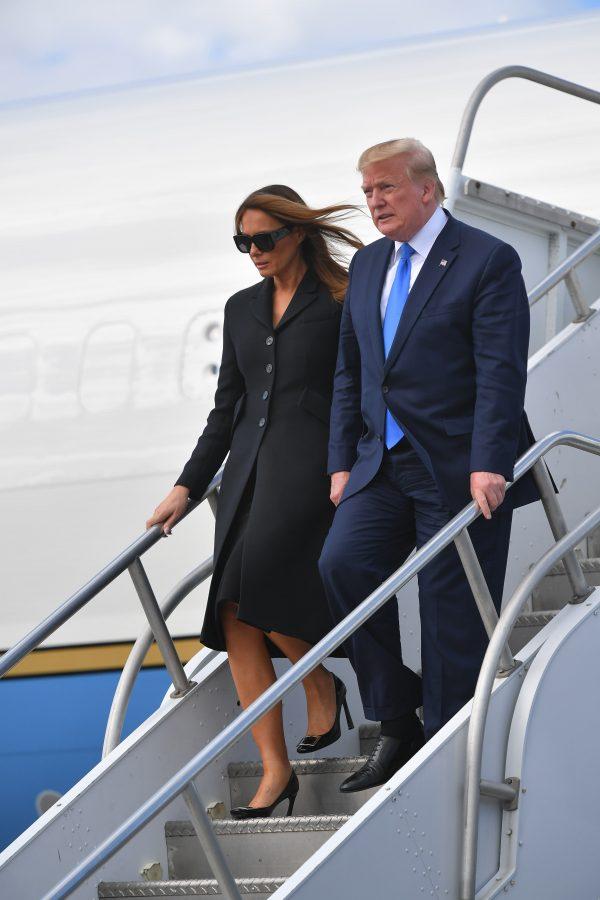 US President Donald Trump (R) and First Lady Melania Trump (L) disembark Air Force One upon arrival at Shannon Airport in Shannon, County Clare, Ireland on June 6, 2019 after attending an event to commemorate the 75th anniversary of the D-Day landings. (Mandel Ngan/AFP/Getty Images)