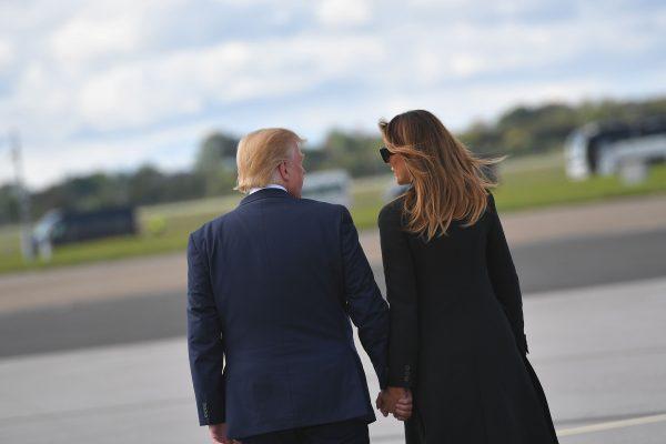 US President Donald Trump (L) and First Lady Melania Trump (R) chat after disembarking Air Force One upon arrival at Shannon Airport in Shannon, County Clare, Ireland on June 6, 2019 after attending an event to commemorate the 75th anniversary of the D-Day landings. (Mandel Ngan/AFP/Getty Images)