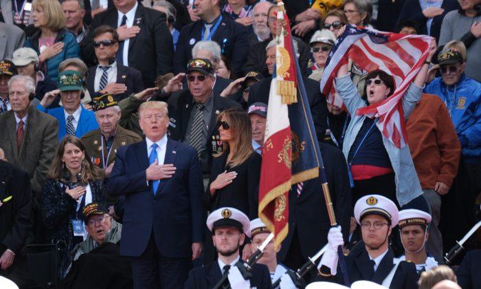 Melania Trump High-Fives 95-Year-Old Veteran Who Received a Legion of Honor Medal During D-Day Ceremony