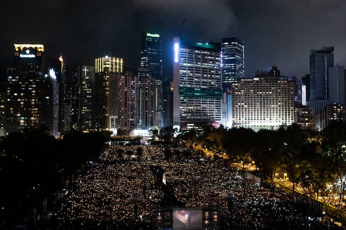 People attend a candlelight vigil at Victoria Park in Hong Kong on June 4, 2019, to mark the 30th anniversary of the 1989 Tiananmen Square massacre in Beijing. (PHILIP FONG/AFP/Getty Images)
