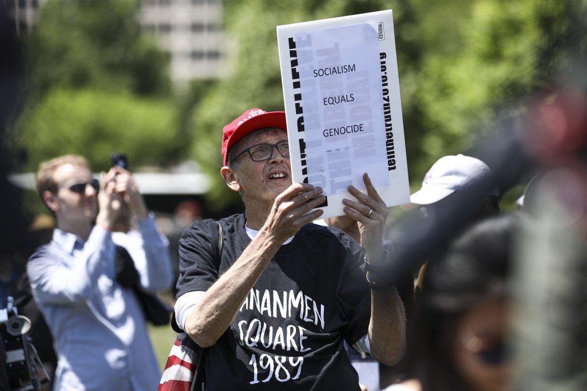 A man attends a rally to commemorate the 30th anniversary of the Tiananmen Square massacre, on the West Lawn the Capitol on June 4, 2019. (Samira Bouaou/The Epoch Times)