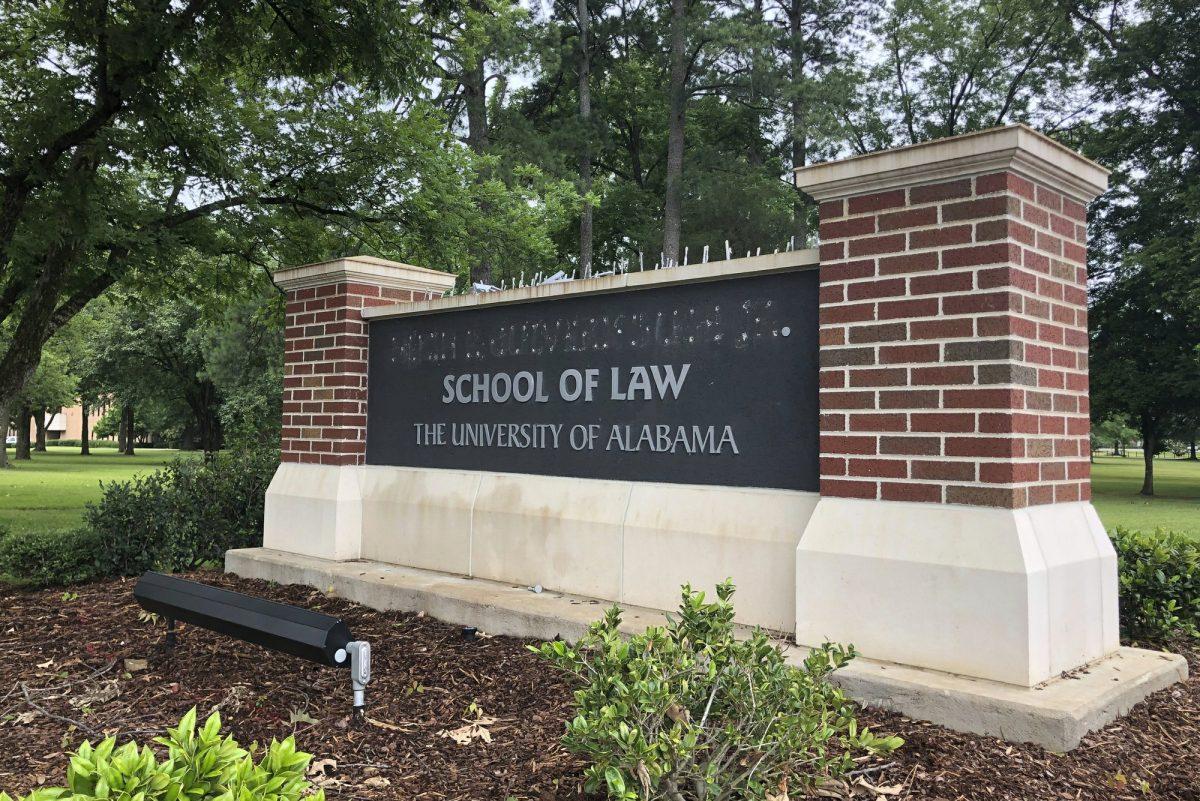 University of Alabama School of Law sign is seen after employees removed the name of donor Hugh F. Culverhouse Jr. in Tuscaloosa, Ala., on June 7, 2019. (Blake Paterson/AP Photo)