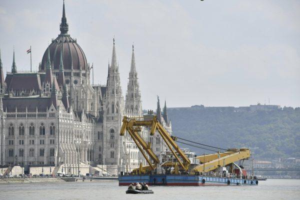 A 200-ton lift capacity crane named Clark Adam is positioned near the Margaret Bridge, the scene of the deadly boat accident in Budapest, Hungary, on June 7, 2019. (Zoltan Balogh/MTI via AP)