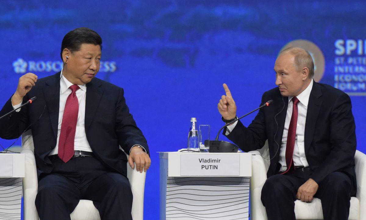 Chinese leader Xi Jinping and Russian President Vladimir Putin attend the St. Petersburg International Economic Forum in St. Petersburg, Russia, on June 7, 2019. (Olga Maltseva/AFP/Getty Images)