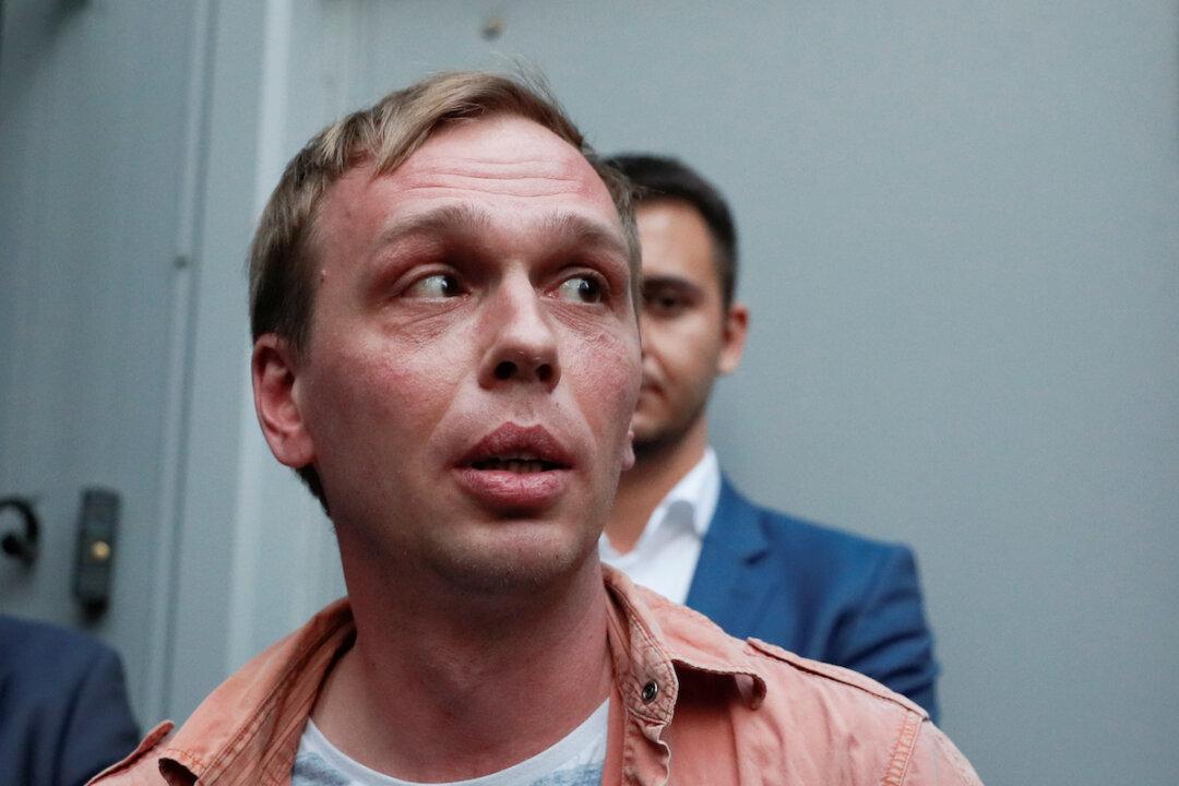 Russia, in Rare U-turn After Public Anger, Drops Case Against Journalist