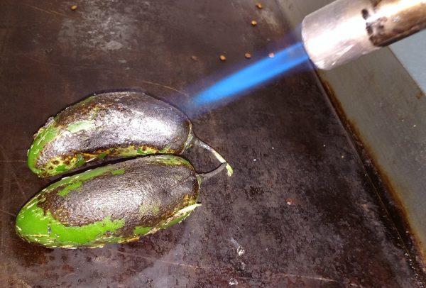 Char your jalapeños until thoroughly blackened and blistered. (Courtesy of Jalisco Kitchen)