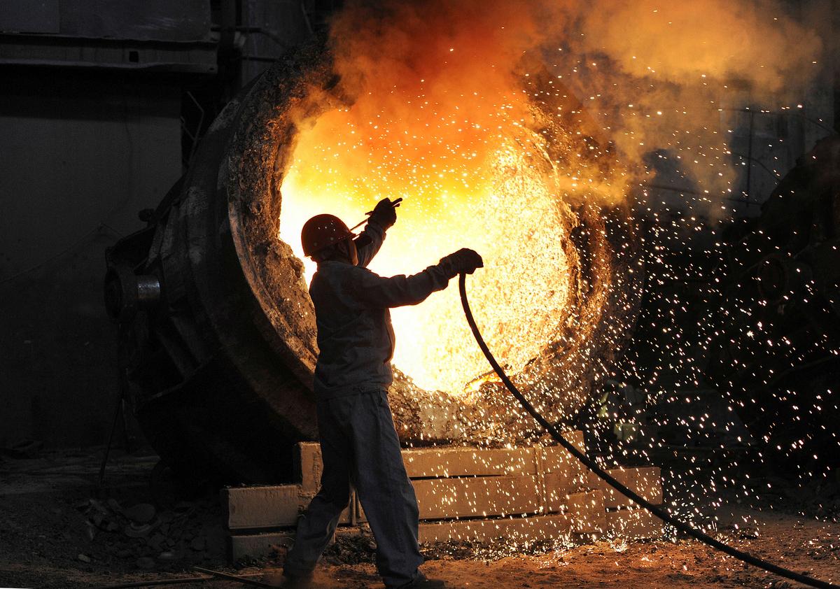 An employee works at the Maanshan steel and iron factory in Hefei, Anhui Province on Sept. 25, 2010. (Reuters)