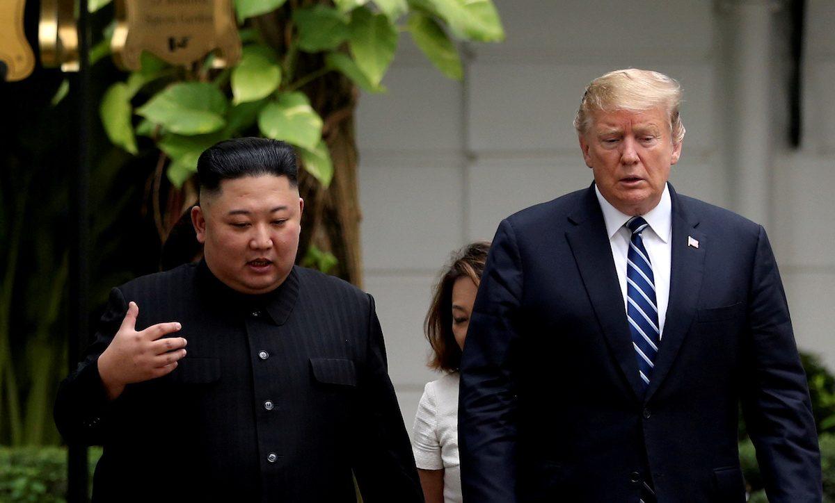 North Korea's leader Kim Jong Un and U.S. President Donald Trump talk in the garden of the Metropole hotel during the second North Korea–U.S. summit in Hanoi, Vietnam Feb. 28, 2019. (Leah Millis/Reuters)
