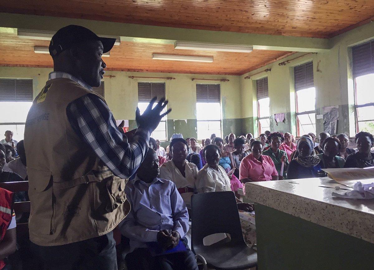 Hospital staff and others being briefed on how to keep themselves safe, at Bwera hospital where the confirmed and suspected cases of Ebola are being treated on June 12, 2019 in Kasese District, western Uganda, near the border with Congo. (Ben Wise/International Rescue Committee via AP)