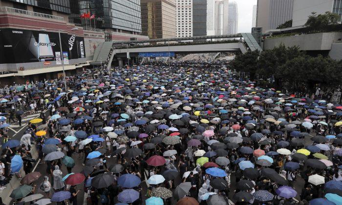 Hong Kong Protesters Vow to Keep Fighting Extradition Law