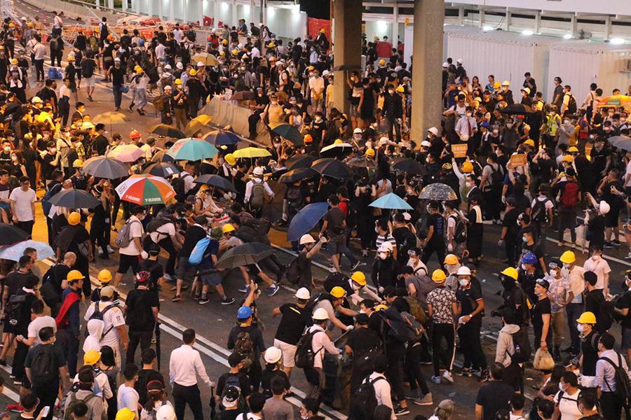 At least 22 protesters were injured after Hong Kong police used tear gas, rubber bullets, and bean bags to clear the crowd, on June 12, 2019.