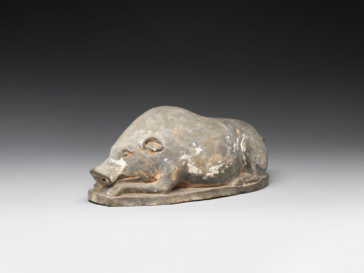 “Pig in Recumbent Position,” 6th century. Earthenware with pigment. Gift of Mr. and Mrs. Ezekiel Schloss, 1985. (The Metropolitan Museum of Art)
