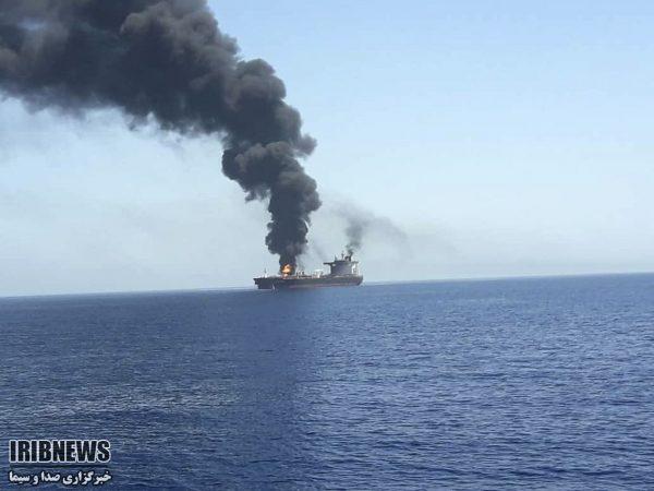 In this photo released by state-run IRIB News Agency, an oil tanker is on fire in the sea of Oman on June 13, 2019. (IRIB News Agency via AP)