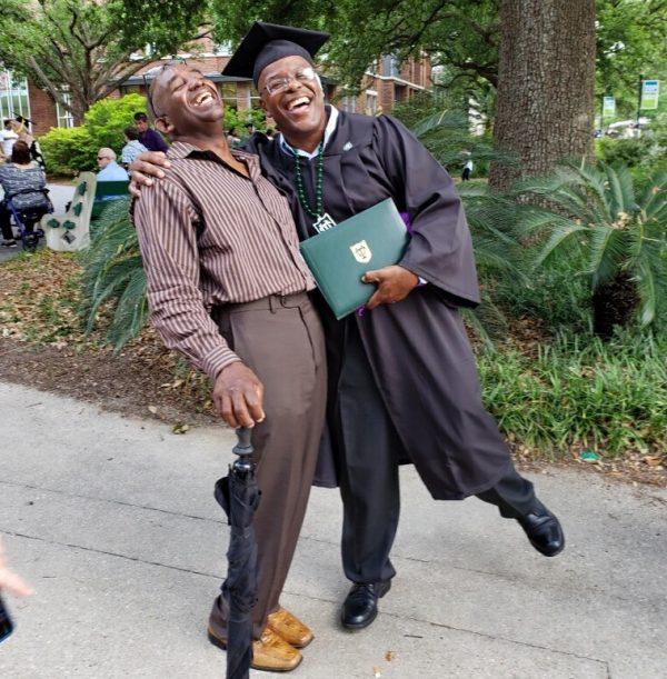 Calvin Duncan (R) with his best friend Alvin Abbott during his graduation from Tulane University in May 2019. (Courtesy of Calvin Duncan)