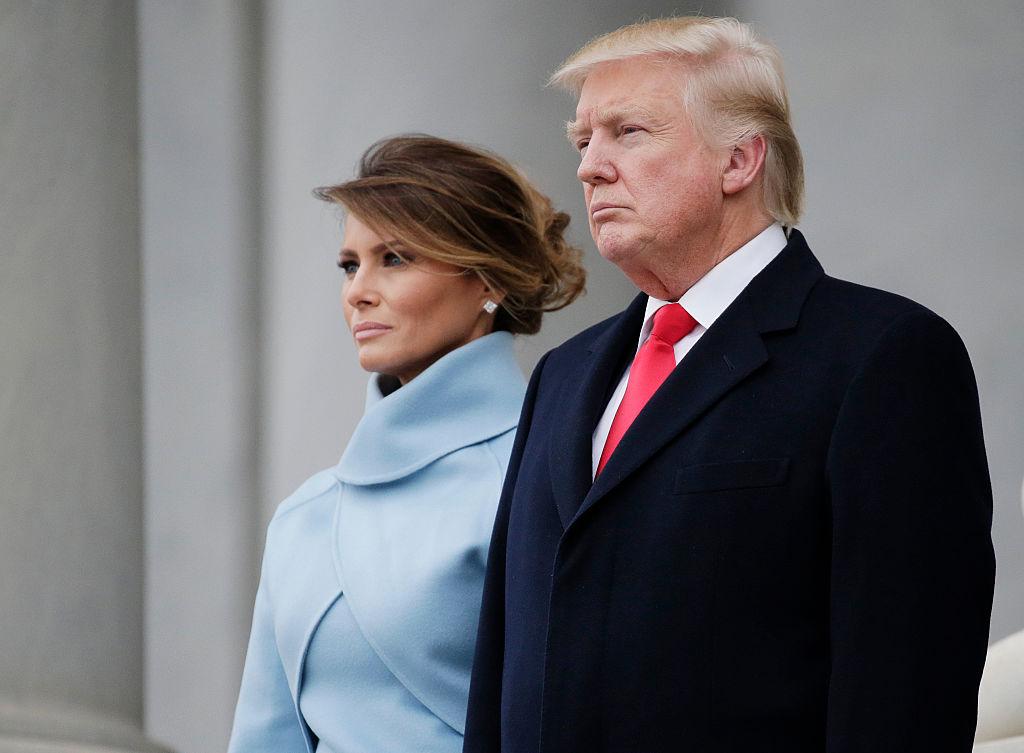 President Donald Trump stands with First Lady Melania Trump at the U.S. Capitol before departing for a parade after Trump was sworn in at the 58th Presidential Inauguration on Capitol Hill in Washington on Jan. 20, 2017. (John Angelillo-Pool/Getty Images)