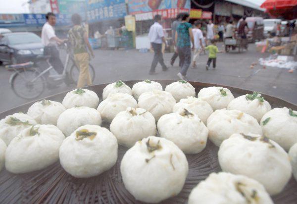 Steamed meat and vegetable buns on sale in Beijing on July 15, 2007. China’s safety standards have come under sharp international criticism amid regular reports of fake, shoddy, or dangerous goods emanating from the nation’s chaotic and corrupt food and drug industry. (Teh Eng Koon/AFP/Getty Images)
