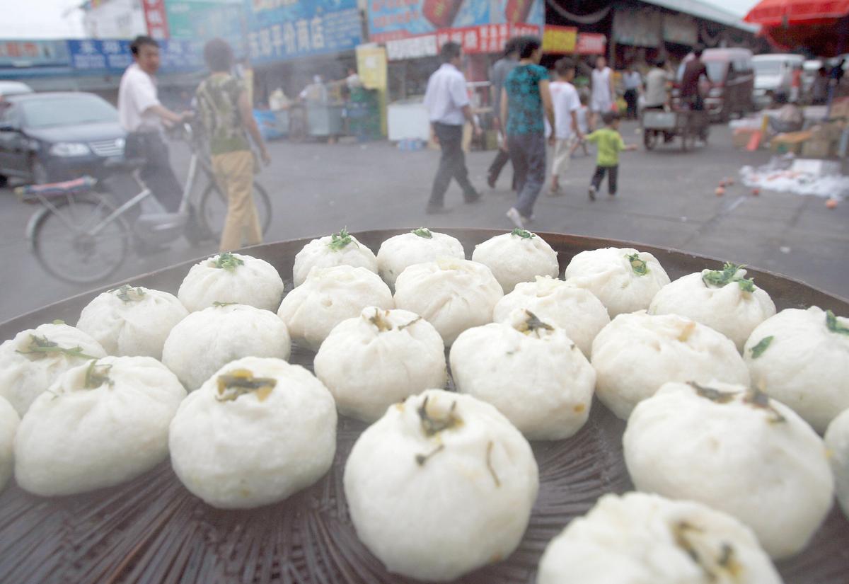 China's safety standards have come under sharp international criticism amid regular reports of fake, shoddy, or dangerous goods emanating from the nation's chaotic and corrupt food and drug industry. (©Getty Images | <a href="https://www.gettyimages.com/detail/news-photo/chinese-steaming-meat-and-vegetable-buns-on-sale-in-beijing-news-photo/75421059?adppopup=true">TEH ENG KOON</a>)