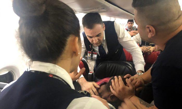 Passengers Subdue Chaotic Man on Board Turkish Airlines Jet