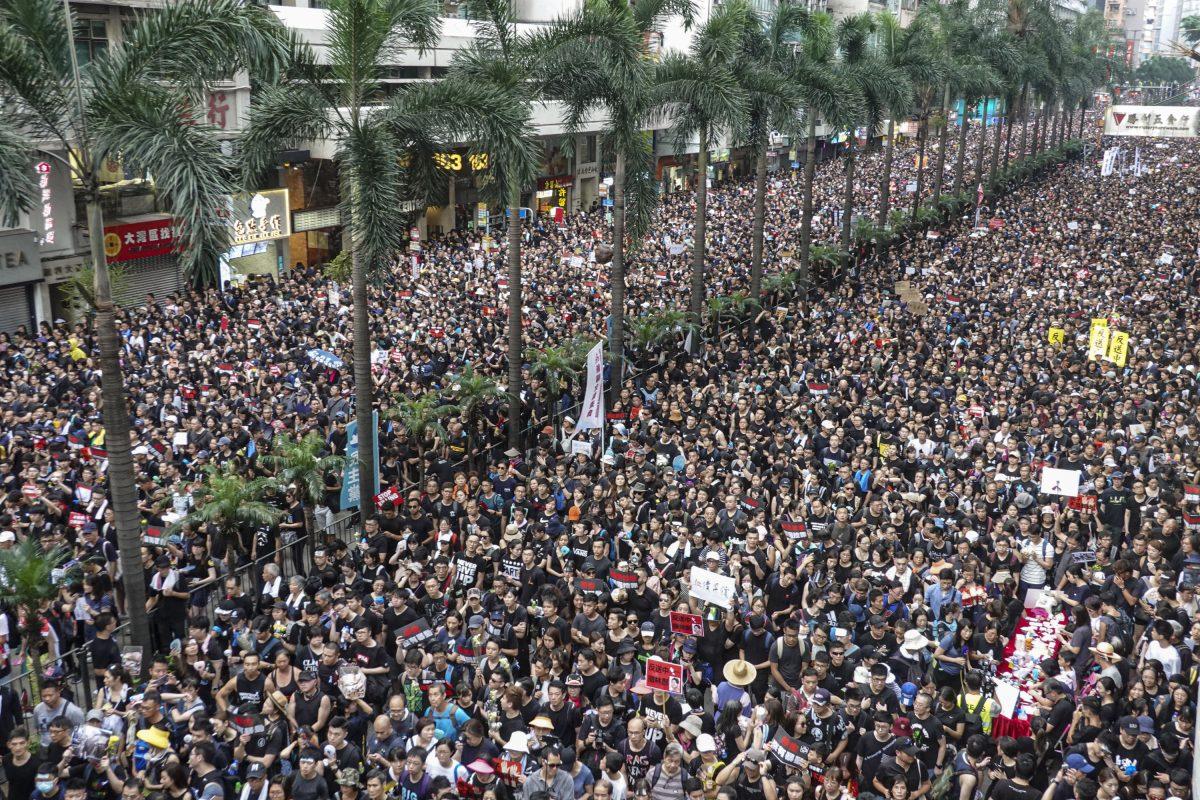 Unsatisfied with the government’s suspension of the controversial extradition bill, an estimated 2 million Hongkongers took to the streets to demand the bill’s full retraction and Hong Kong leader Carrie Lam’s resignation, in Hong Kong on June 16, 2019. (Gang Yu/The Epoch Times)