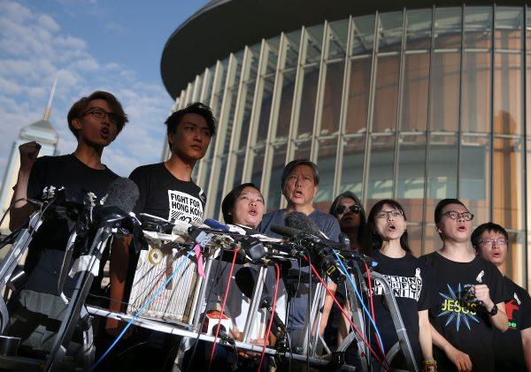 Members of Civil Human Rights Front hold a news conference in response to the announcement by Hong Kong Chief Executive Carrie Lam regarding the proposed extradition bill, outside the Legislative Council building in Hong Kong, June 15, 2019. (Athit Perawongmetha/Reuters)