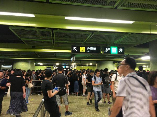 People seen still trying to join the march from Wan Chai Station, Hong Kong, at 4:30 p.m. local time on June 16, 2019. (Li Yi/The Epoch Times)