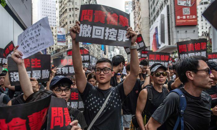 4 Hong Kong Democracy Activists Sentenced to More Than 4 Years in Jail
