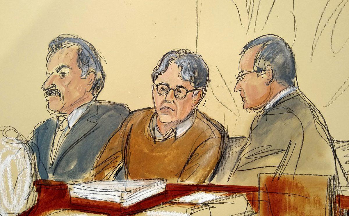 In this May 7, 2019 file courtroom drawing, defendant Keith Raniere, center, leader of the secretive group NXIVM, is seated between his attorneys Paul DerOhannesian, left, and Marc Agnifilo during the first day of his sex trafficking trial. (Elizabeth Williams via AP, File)