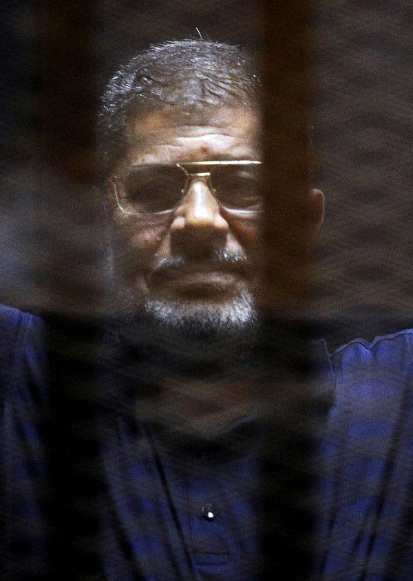 Former Egyptian President Mohamed Mursi looks on during his appearance in court on the outskirts of Cairo, Egypt on June 2, 2015. (Amr Abdallah Dalsh/File Photo via Reuters)