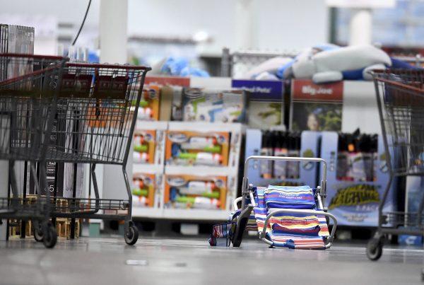 Scattered shopping carts and a flipped over beach chair lay on the ground following a shooting inside a Costco in Corona, Calif., on June 14, 2019. (Will Lester/Inland Valley Daily Bulletin/SCNG via AP)