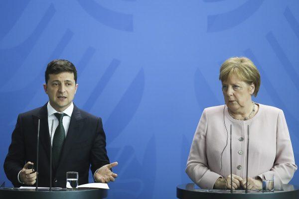German Chancellor Angela Merkel, right, and Ukrainian President Volodymyr Zelenskiy, left, attend a joint news conference after a meeting at the chancellery in Berlin, Germany, on June 18, 2019. (Markus Schreiber/AP Photo)
